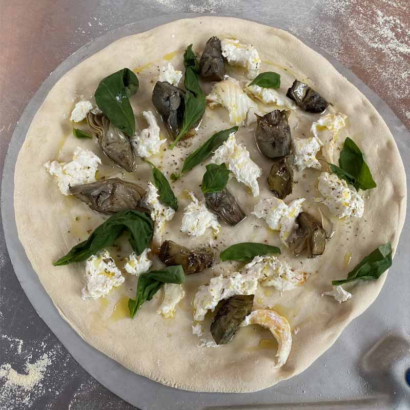 Artichoke and smoked burrata pizza