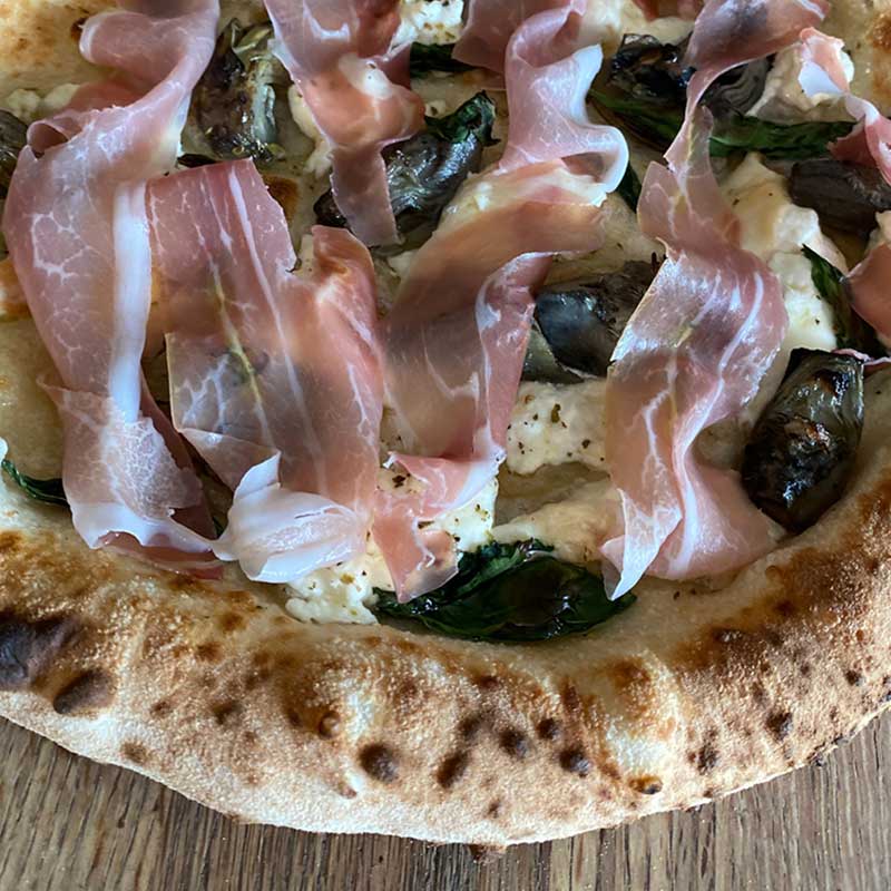 Artichoke and smoked burrata pizza